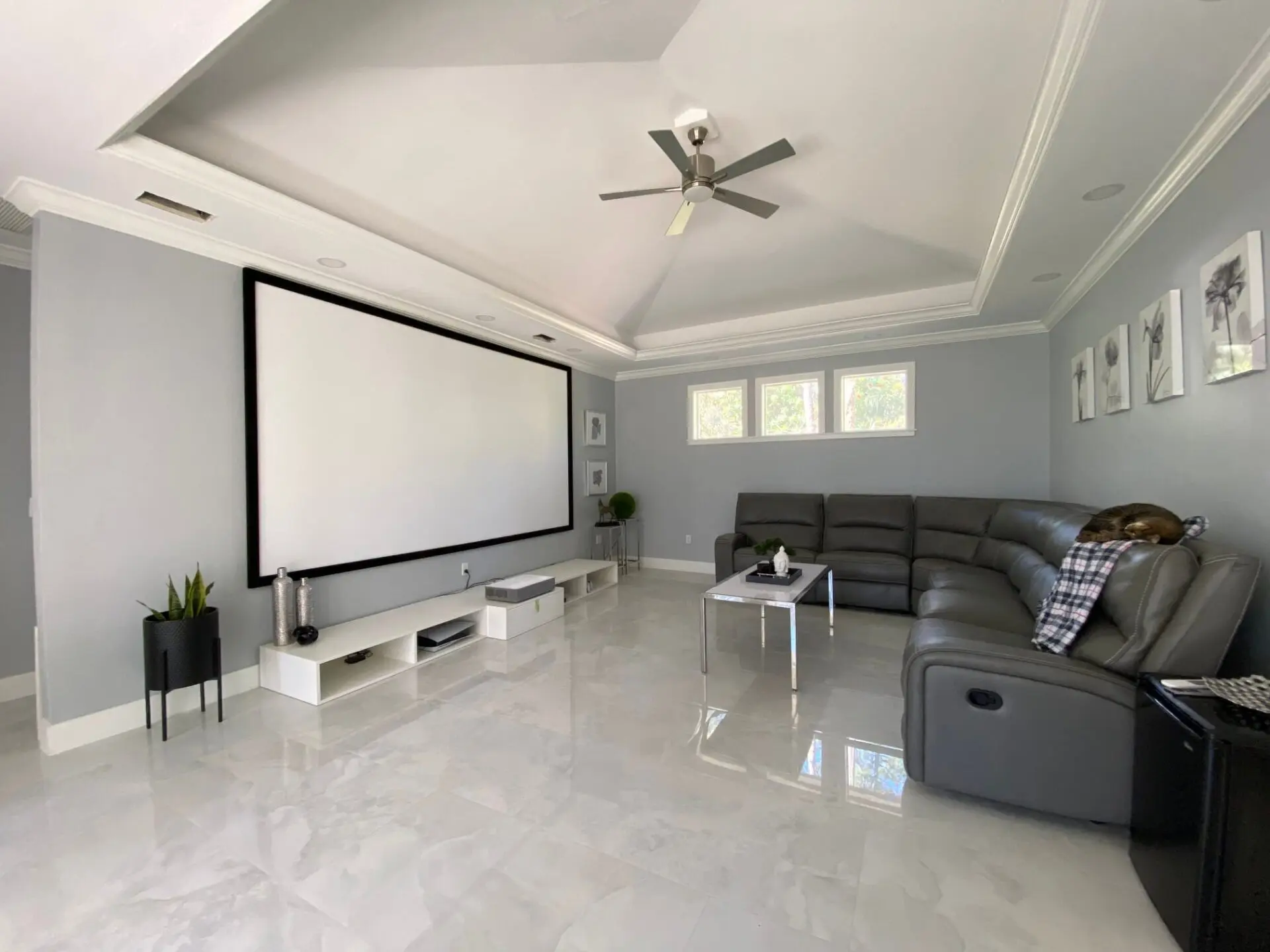 A picture of a white screen in a living area